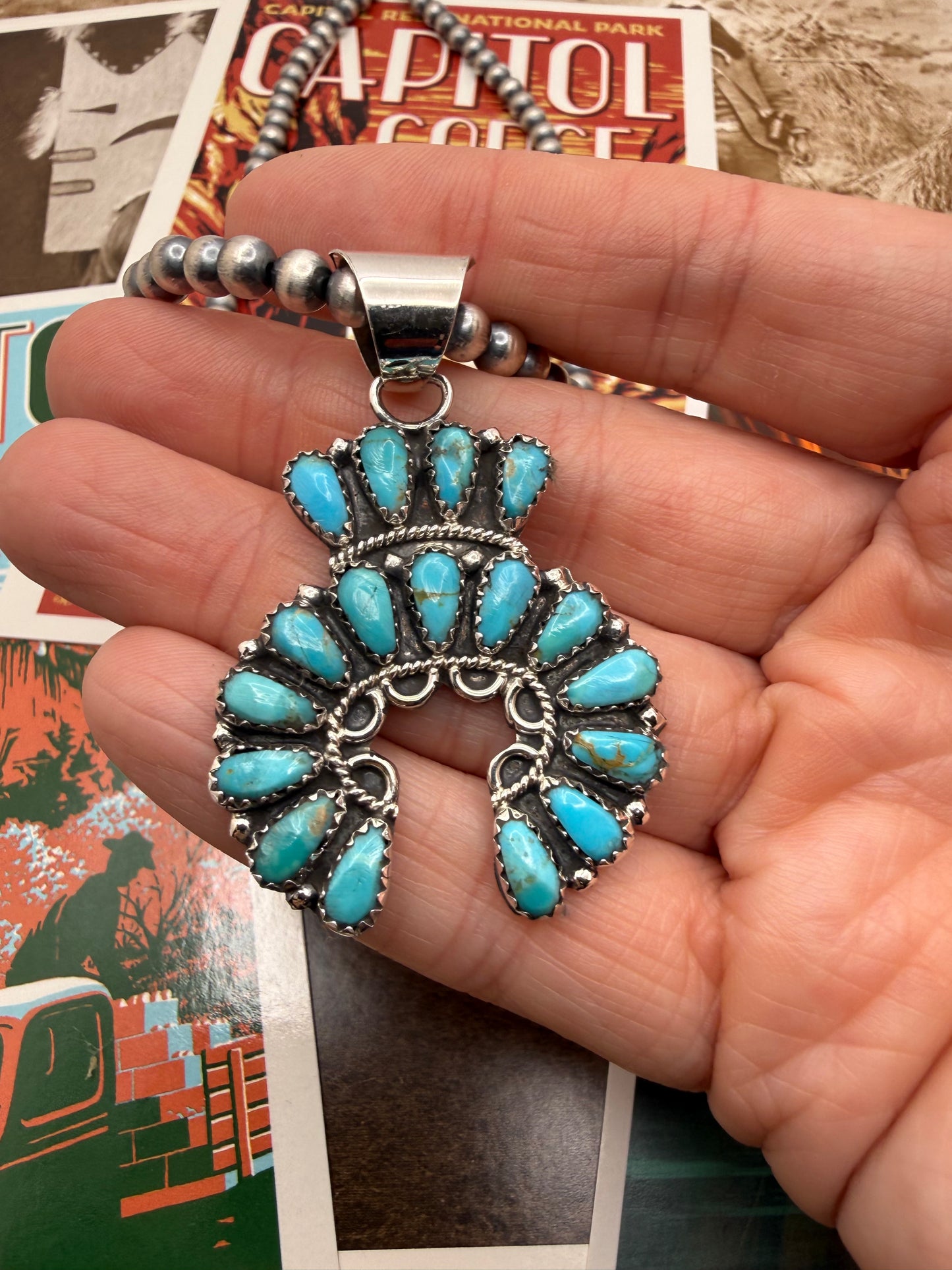 Naja pendant on sterling pearls