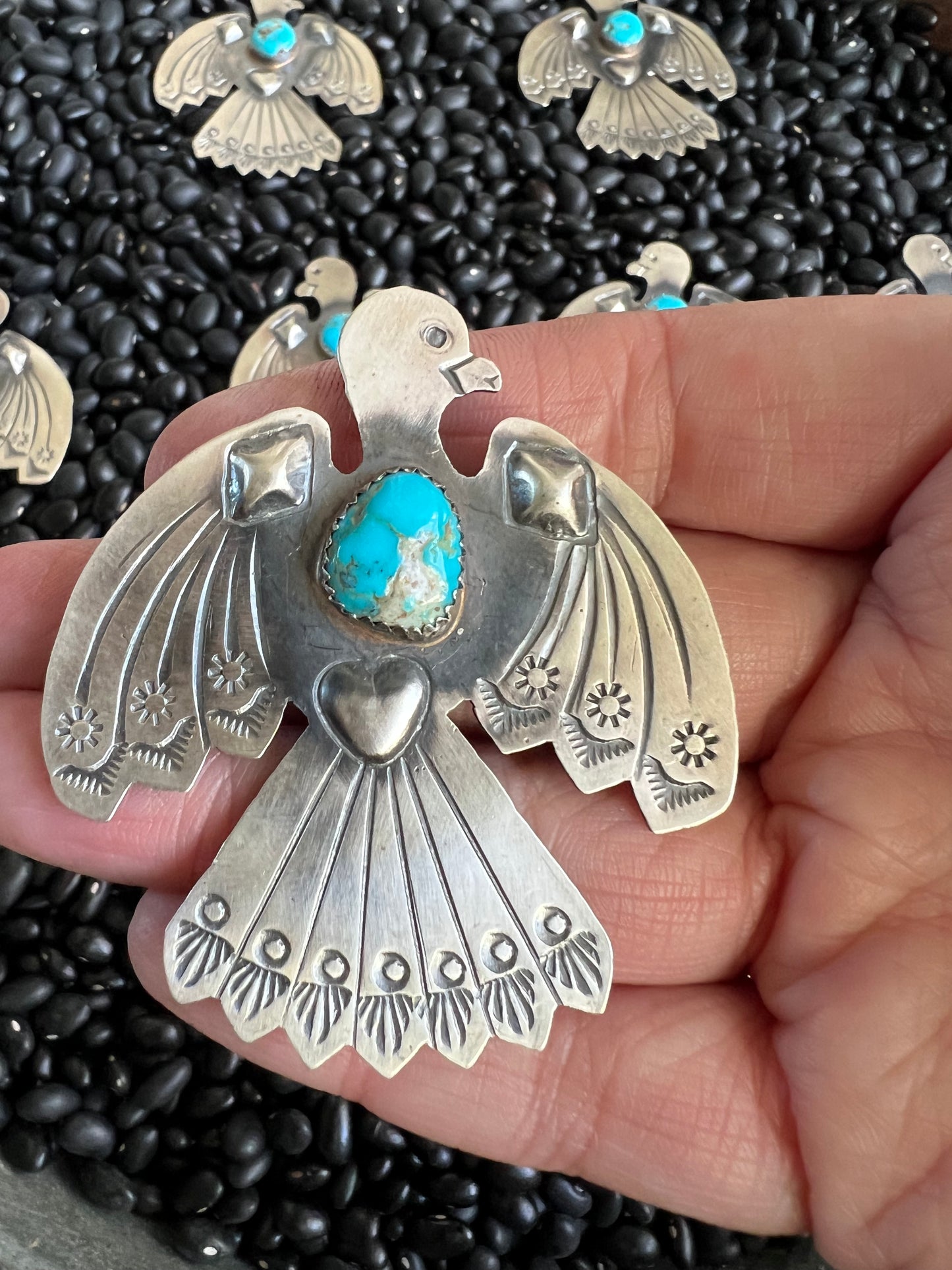 Thunderbird Pendant with natural turquoise nuggets