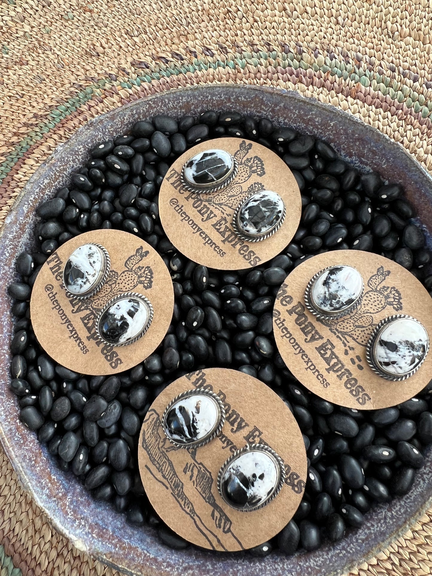 White buffalo stud top earrings